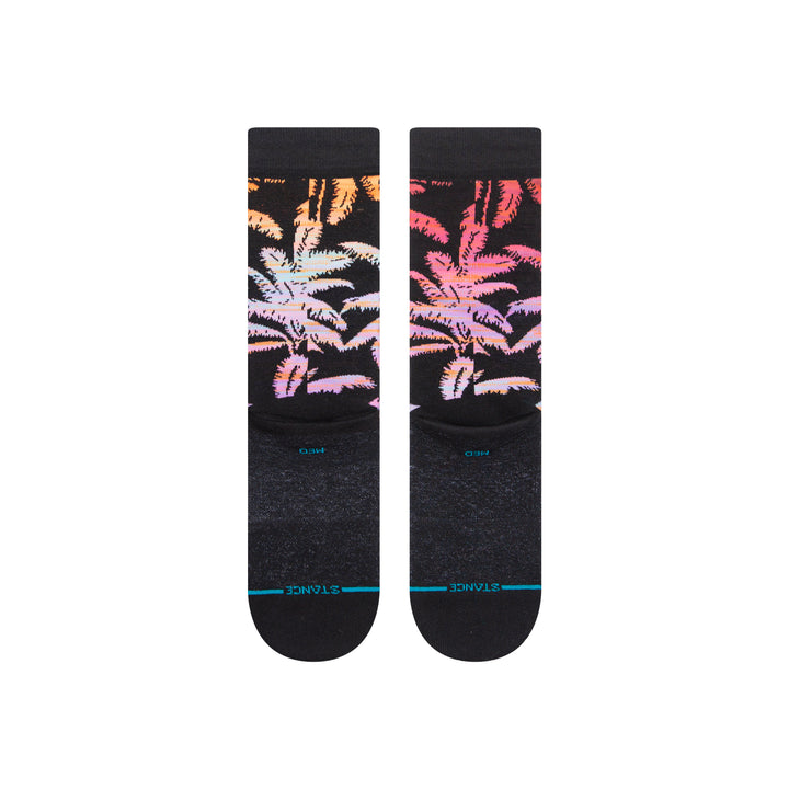 running socks with multicolored palm leaves pattern